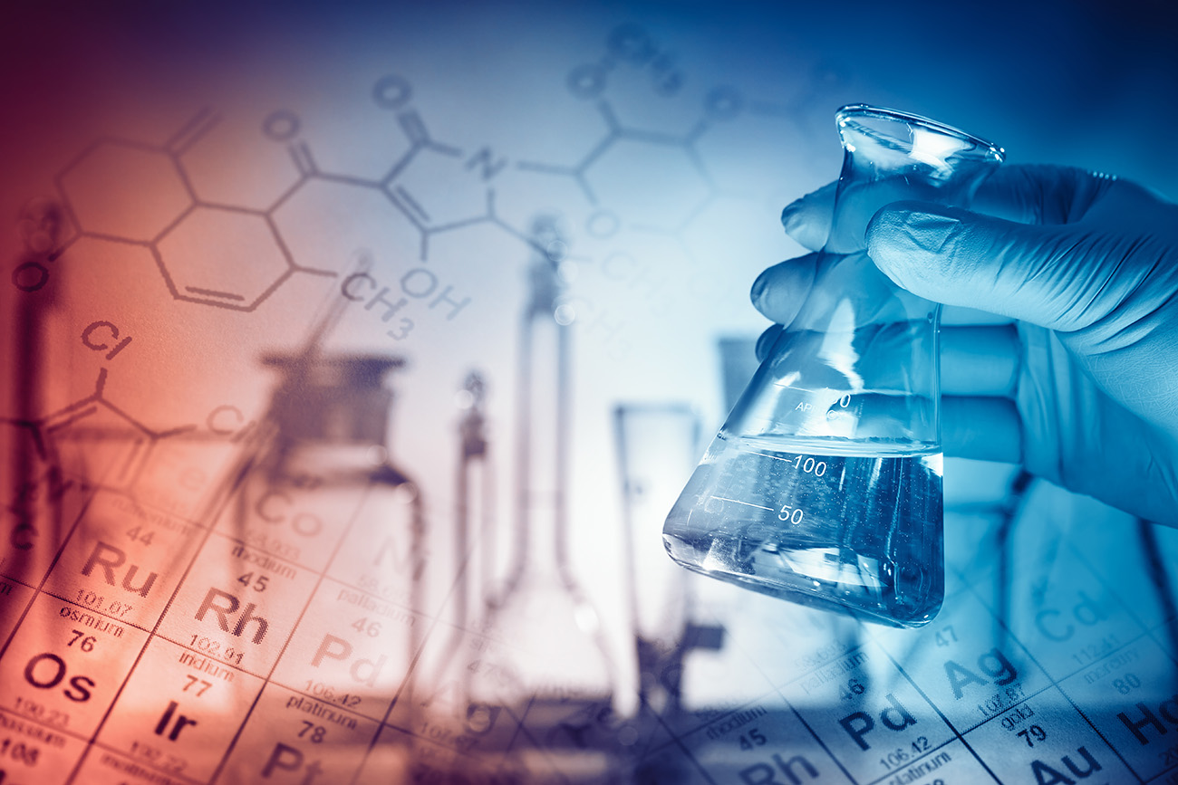 Chemistry glassware with colorful liquids and molecular structures.